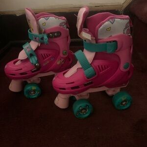 Pink and Teal Roller Skates